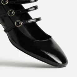 Babies noires cuir verni trois brides