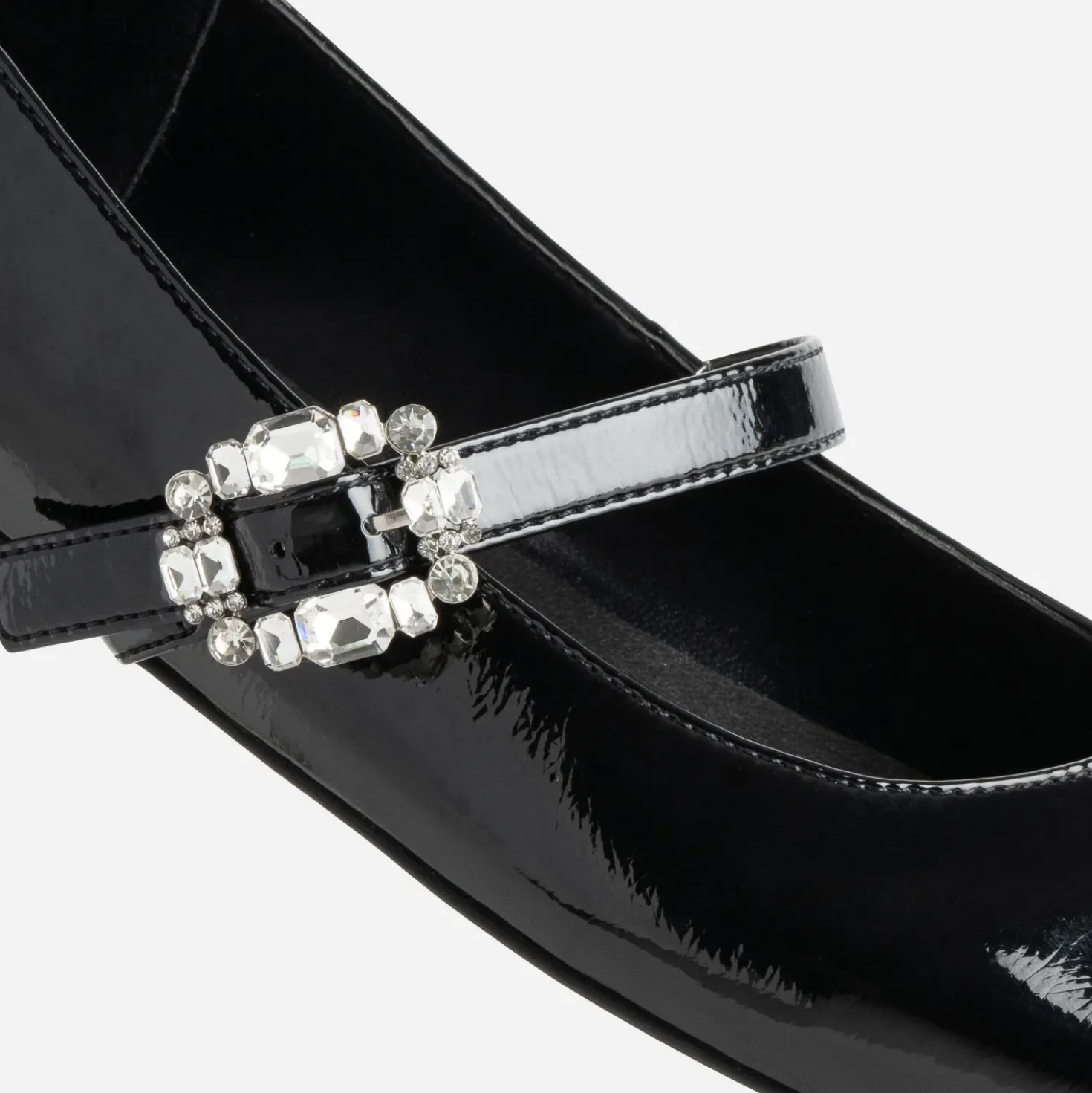 Babies noire vernie boucle strass