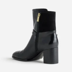 Boots noir bi-matière décor boucle