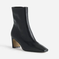 Boots noir cuir talon incurvé