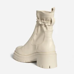 Boots TEXTO écru avec bride amovible