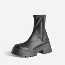 Boots TEXTO noir à semelle épaisse et crantée