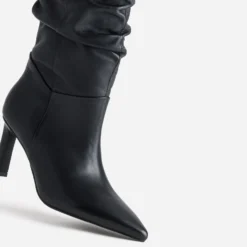 Botte noir cuir drapé