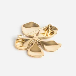 Broche jaune métal forme fleur