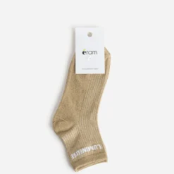 Chaussettes beiges pailletées à message