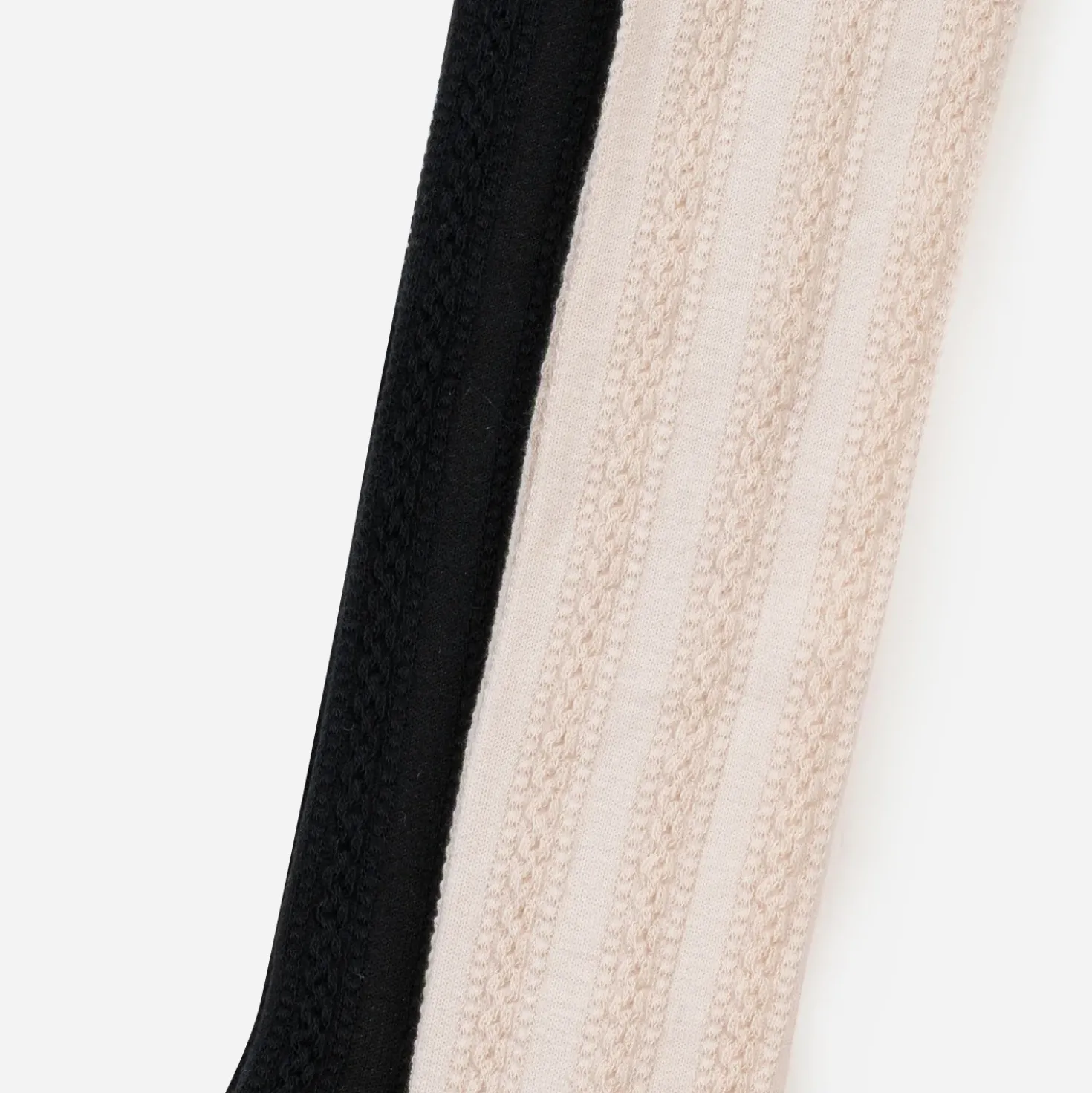 Chaussettes hautes noir et écru torsades