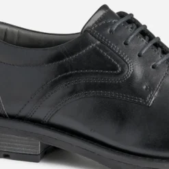 Derby noir en cuir à doublure carreaux