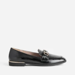 Mocassin noir barrette dorée