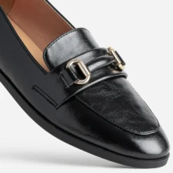 Mocassin noir barrette dorée