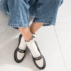 Mocassin noir et beige cuir