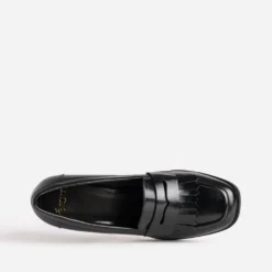 Mocassin à talon noir patte frangée