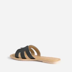 Mule noire en cuir grainé