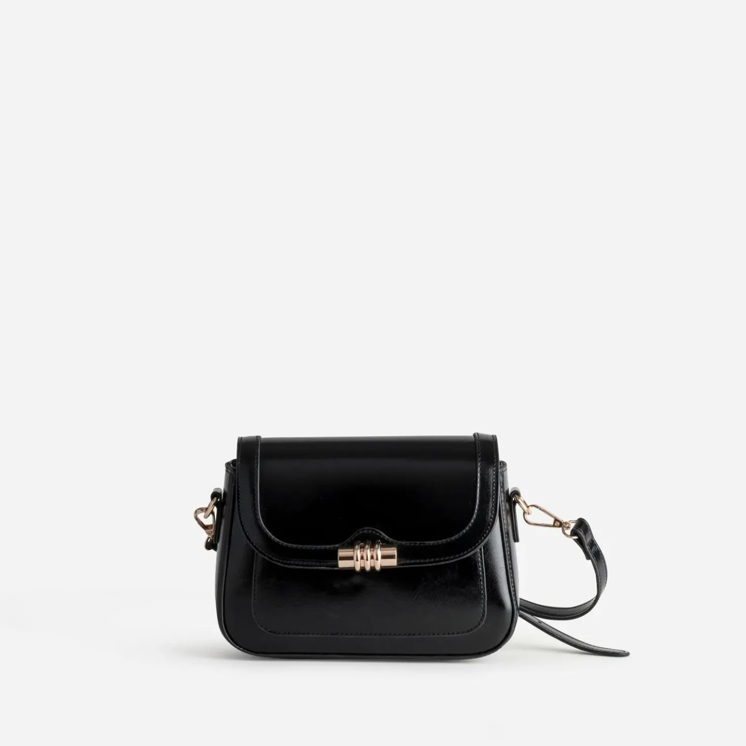 Sac à main noir fermoir doré