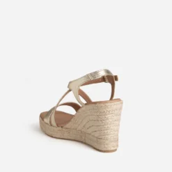 Sandale compensée dorée cuir