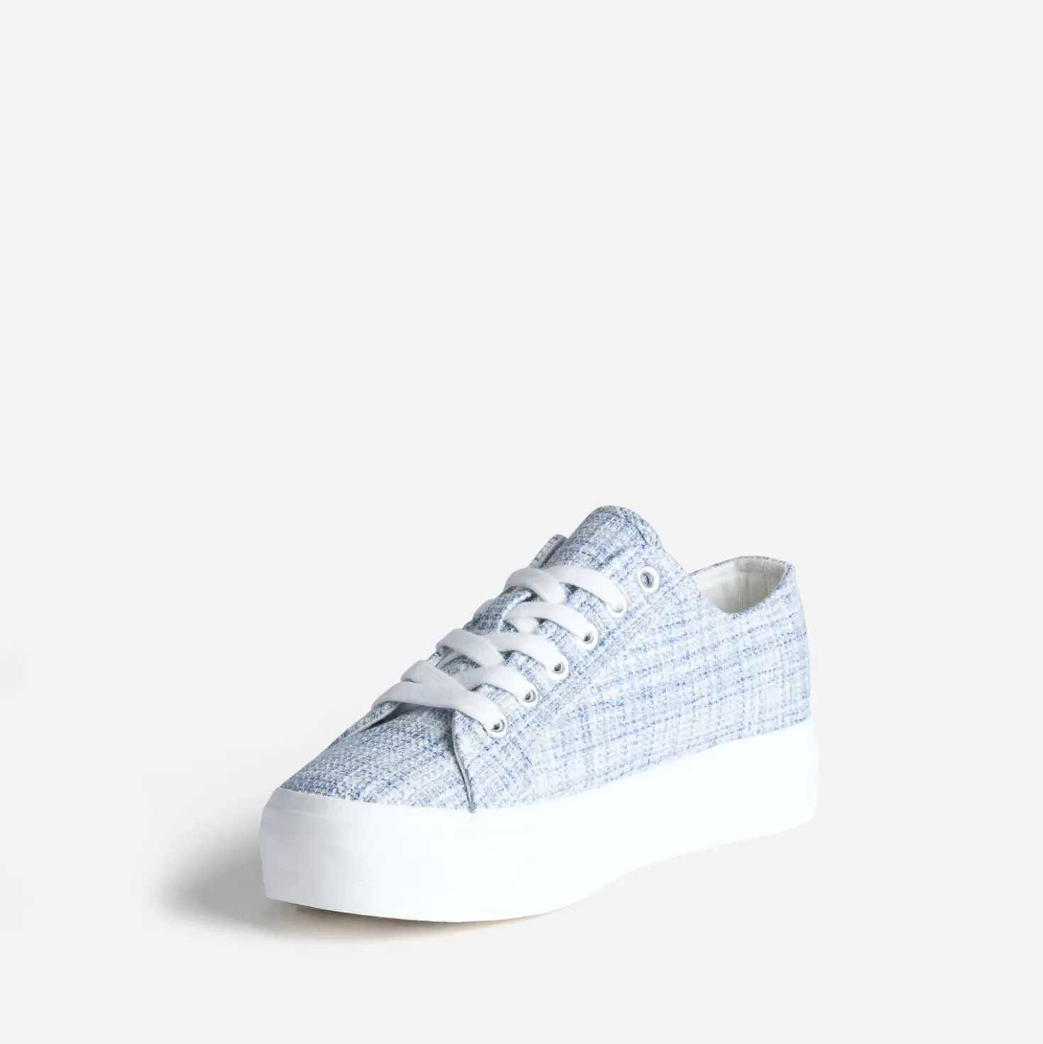 Tennis toile bleue à semelle blanche
